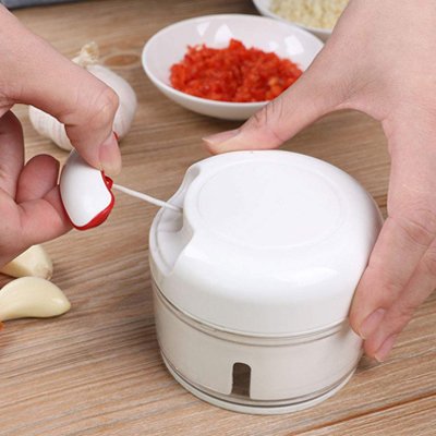 Mini hachoir manuel utile pour sauces